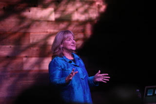 Laurel-speaking-at-a-Parnell-Institute-conference-at-1440-Multiversity-in-2017_